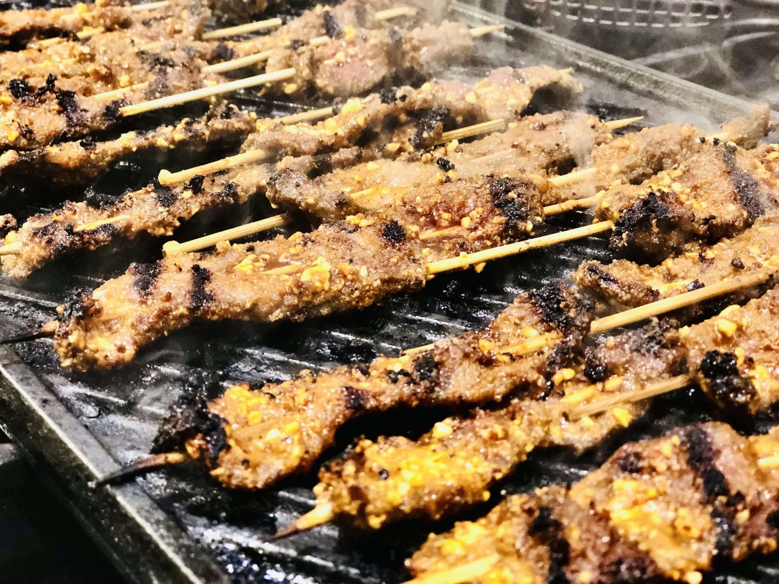 Suya (grilled skewered meat)