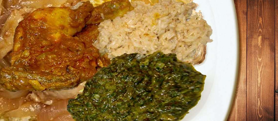 Poulet Nyembwe (chicken cooked in palm oil)