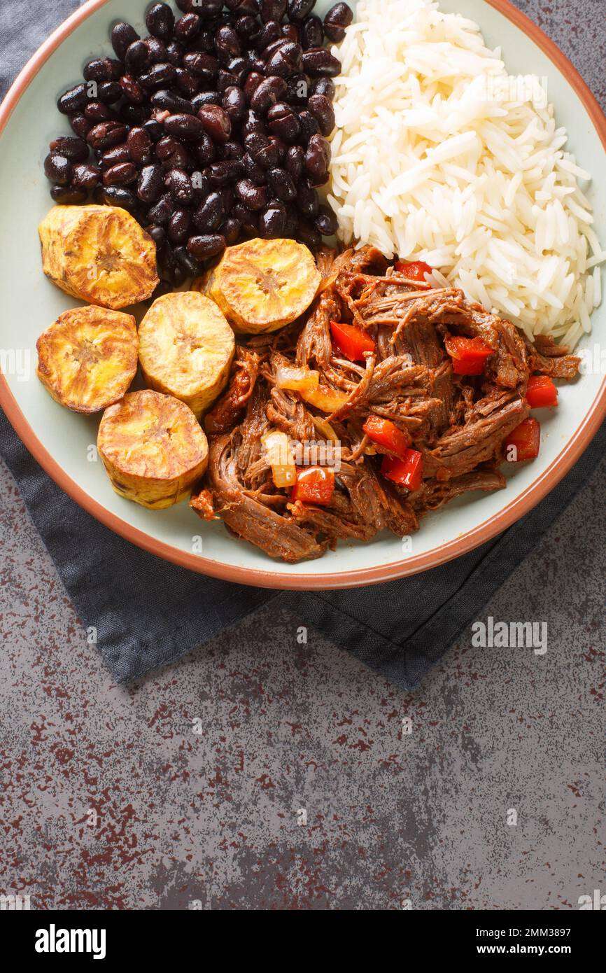 Pabellón Criollo (shredded beef with rice, beans, and plantains)